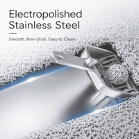 Stainless steel kitchen tool on a textured white surface with text about material properties.