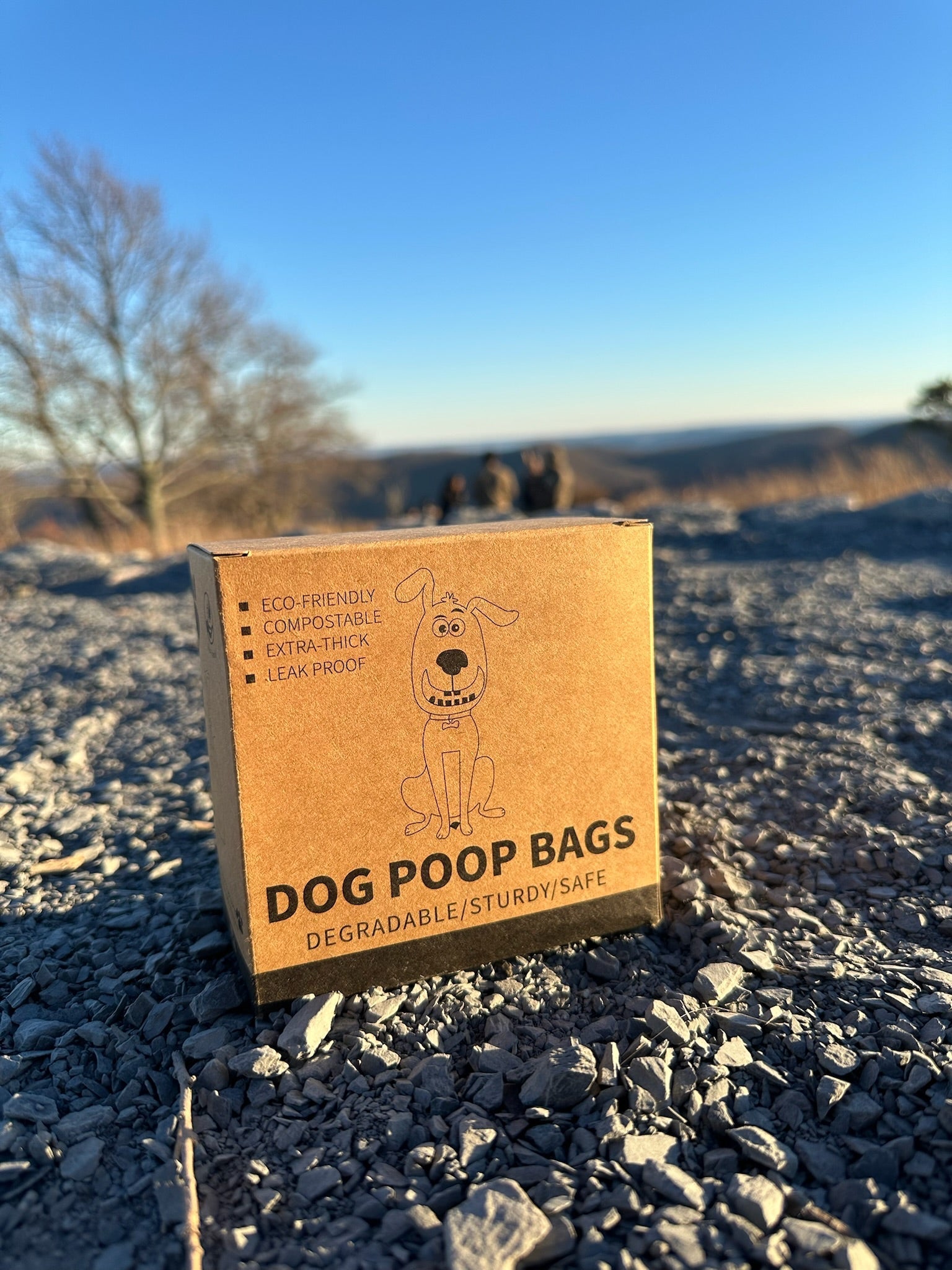 biodegradable trash pet poop bags along with a dispenser designed for convenience and easy to tear